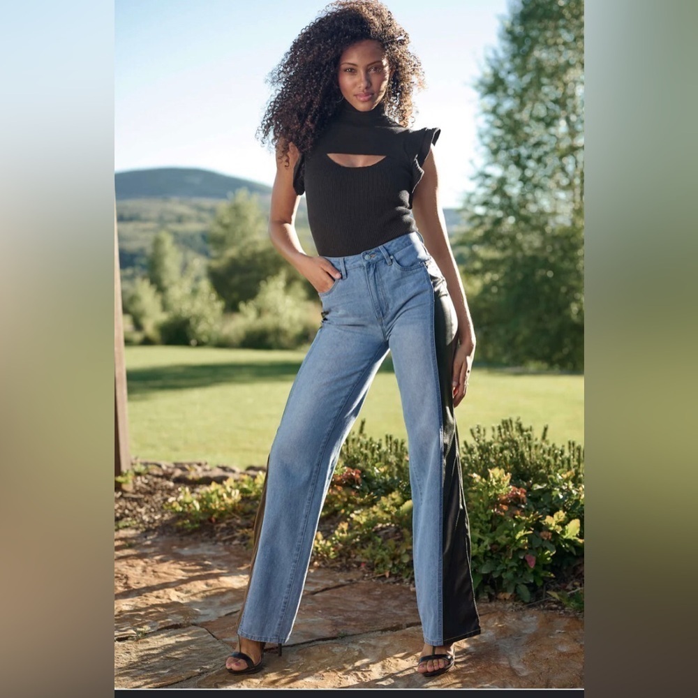 Women’s jeans with black snake skin side stripe